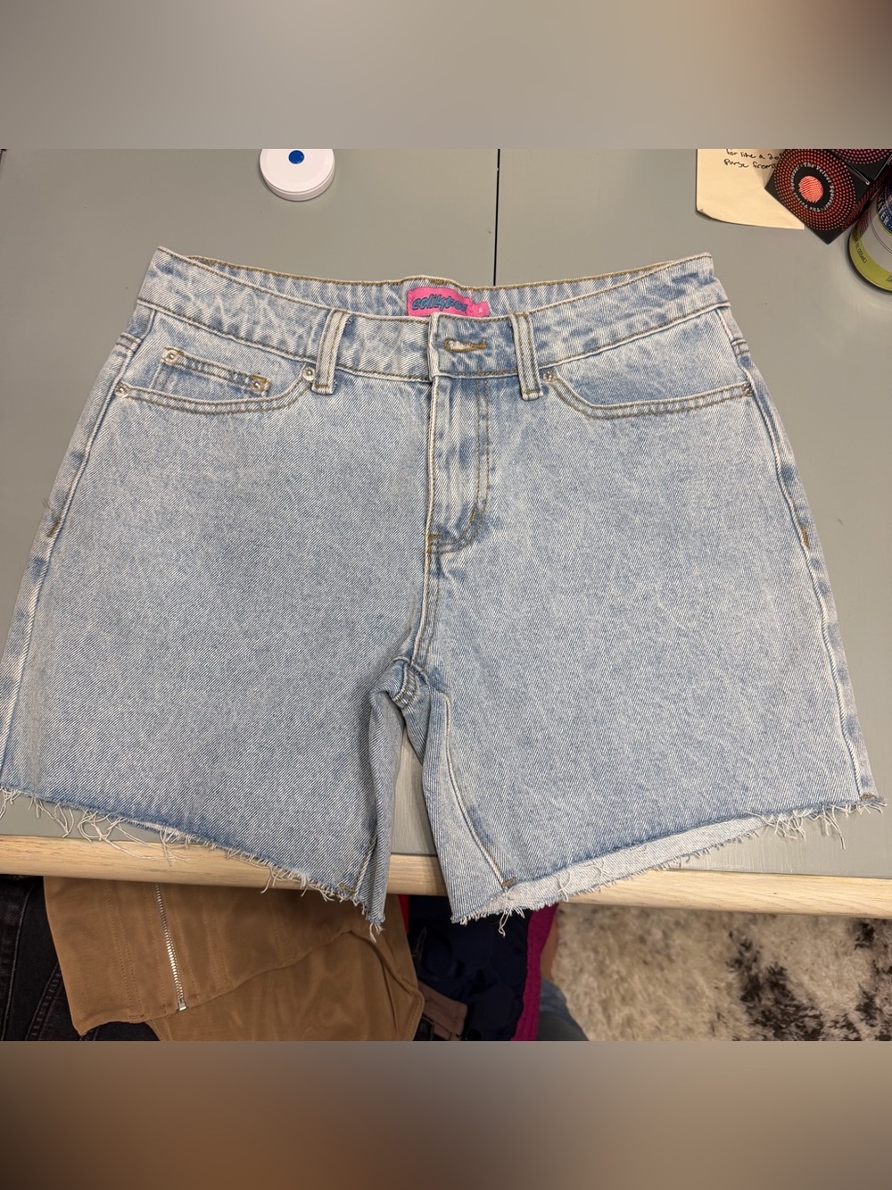 Edikted Light Wash Denim Cutoff Shorts